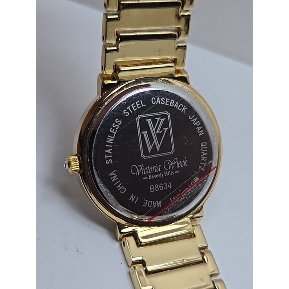 Victoria Wieck B8634 Gold Tone Crystal Sun Moon Celestial Blue Watch New Battery main image 5